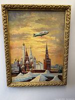 Full front view of signed oil painting in gilt frame