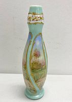 Front view of French Art Nouveau opaque hand-painted glass vase showing landscape scene and gold detailing.