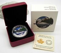 2016 $20 fine silver coin housed in a red presentation box with outer box featuring loon imagery.