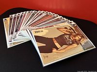 Fanned out display of 21 Buffy the Vampire Slayer Season 8 comic books with full-cover artwork visible, showing a variety of covers featuring Buffy and other characters.