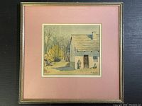 Full view of framed watercolour painting showing a cottage scene and frame.