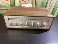 Front view of Yamaha CR-420 stereo receiver showing wood casing and control panel.
