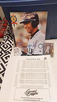 Signed Raul Mondesi 1995 Grand Salami baseball card in Mariners uniform with stats sheet beneath it