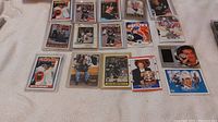 All 14 Wayne Gretzky hockey cards laid out showing variety of designs