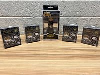 Wide shot showing one boxed Cersei Lannister Rock Candy figure surrounded by four mini mystery figure boxes