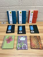 Nine new journals including faux leather snap-close, textured small size, and decorative cover journals portioned in three rows