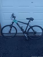 Side profile of the Trek 4500 mountain bike showing full frame, tires, and seat.