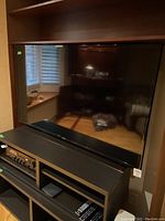 Front view of Samsung TV on stand