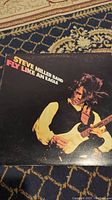 Album cover showing Steve Miller on guitar with title text