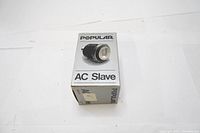 Photo of the Popular AC Electronic Flash Slave in its original box showing front product image and branding.