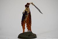 Front view of the painted Jalinrix figurine showing the detailed wings, sword raised, and pose.