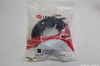Photo of the sealed UltraLink HDMI cable packaging showing the coiled black cable inside.