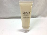 Full view of the beige/cream colored 75ml tube of Shiseido WASO Soft+Cushy Polisher showing front label and white cap.