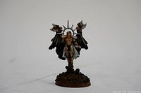 Front angle of Saint Celestina figurine showing detailed armor, wings, and base.