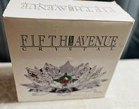 Box of the Fifth Avenue Crystal Christmas Centrepiece showing brand and product image