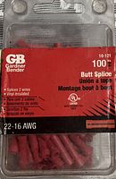 Photo of Gardner Bender vinyl insulated red butt splice connectors in clear plastic packaging with red label indicating 100 pieces, 22-16 AWG size.