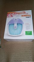 Original product box showing top front view of the Conair Body Benefits footbath with heat and vibration.