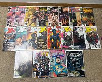 Full overview of all the comics laid out on a carpet including New Mutants, X-Men, Secret Wars, and Spider-Man.
