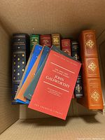 Mixed group of Franklin Library leather volumes and small-format booklets in cardboard box