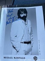 Autographed black and white studio photo of Michael McDonald with personal message
