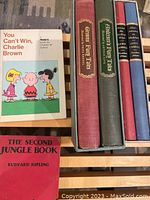 A group of children's vintage and antique books including You Can't Win, Charlie Brown, The Second Jungle Book, and fairy tale collections by Grimm and Andersen, along with two copies of Alice's Adventures in Wonderland.
