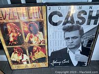 Led Zeppelin collage and Johnny Cash portrait framed posters side by side