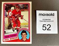 Front view of the 1984-85 Topps Steve Yzerman rookie card showing the player skating and a headshot inset, displayed with MaxSold tag.