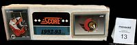 Box containing the full set of 1992-93 Score hockey cards, showing front design featuring Ottawa Senators logo and branding from the 1992-93 season along with a card sleeve containing a player card.