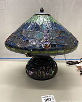 Front view of assembled lamp showing shade and base design