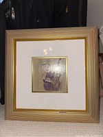 Framed acrylic painting on paper by Robert Rosati with an abstract seated figure, gold stepped frame with white mat