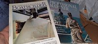 Two boating and marine industry magazines, Professional BoatBuilder and Professional Mariner with boats on the covers.