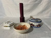 Four home decor pieces: Moorcroft floral dish, ceramic vase, Coalport candy dish, Delft covered dish