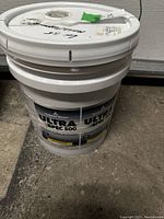 Front view of the white 5-gallon Benjamin Moore paint pail labeled Ultra Spec 500.
