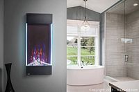 Mounted vertical fireplace with flame effect and LED side accents in a bathroom setting