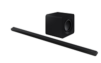 Product shot of black soundbar and wireless subwoofer