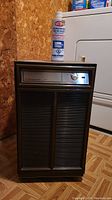 Photo of vintage Hotpoint 20 dehumidifier showing full front view with control panel and vents.