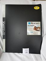 Front cover of the Itoya Art Profolio with product labeling showing dimensions and features.