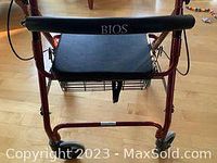 Top view of BIOS walker showing padded seat with brand name BIOS.