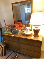 Overall view of six-drawer dresser with matching mirror on top showing finish, drawer layout and top surface