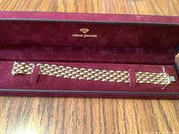Full view of bracelet laid in red velvet Lehigh Jewelers presentation box