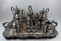 Image showing full coffee and tea set arranged on rectangular ornate silver tray with all items visible