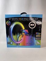 Front of the box showing the Bower 12" White/RGB Ring Light Kit with 360° ballhead and 6.2-foot extendable tripod. Features 12-inch ring light with RGB and white lighting modes for use with smartphones.