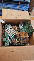 Box filled with assorted electronic circuit boards and components, weighing 17 lbs.