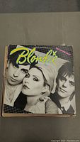 Front cover of Blondie vinyl record album showing band members and title 'Eat to the Beat'.