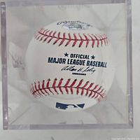 Official Major League Baseball showing the printed logo and commissioner's signature.