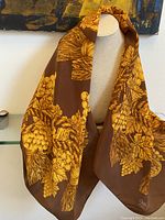 Scarf draped on mannequin showing overall print and drape
