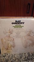 Photo of Ray Conniff vinyl record album cover titled 'You Are The Sunshine Of My Life'. The cover shows stains and wear and a handwritten number '549'.
