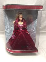 Full view of the 2002 Special Edition Holiday Celebration Barbie Doll in original packaging showing the red velvet dress and accessories.