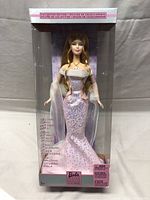 Full view of Barbie Doll in original box showing pink dress and tiaralabeling as Collector Edition
