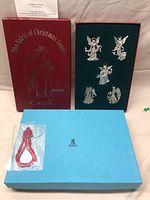 Full set of five BIRKS Christmas angel ornaments in original blue box with red outer box and red hanging cord